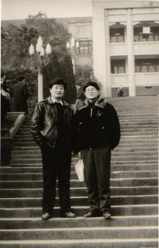 Wu Guofeng, right, with a classmate