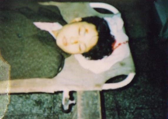 Zhang Jin’s body, showing bullet hole in her forehead
