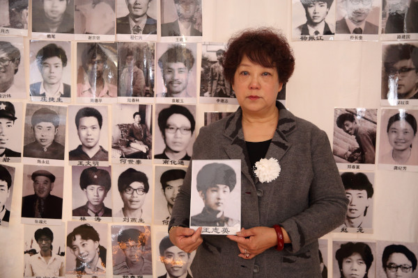 Zhang Yanqiu (张彦秋), Wang Zhiying’s wife, holding his portrait at the Tiananmen Mothers’ 30th anniversary commemoration of June Fourth victims, March 2019, March 2019